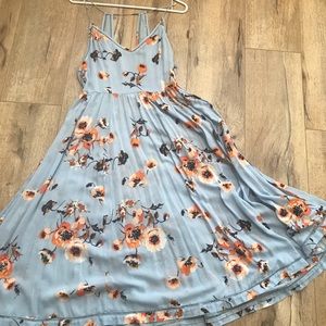 Long floral dress with cute back.